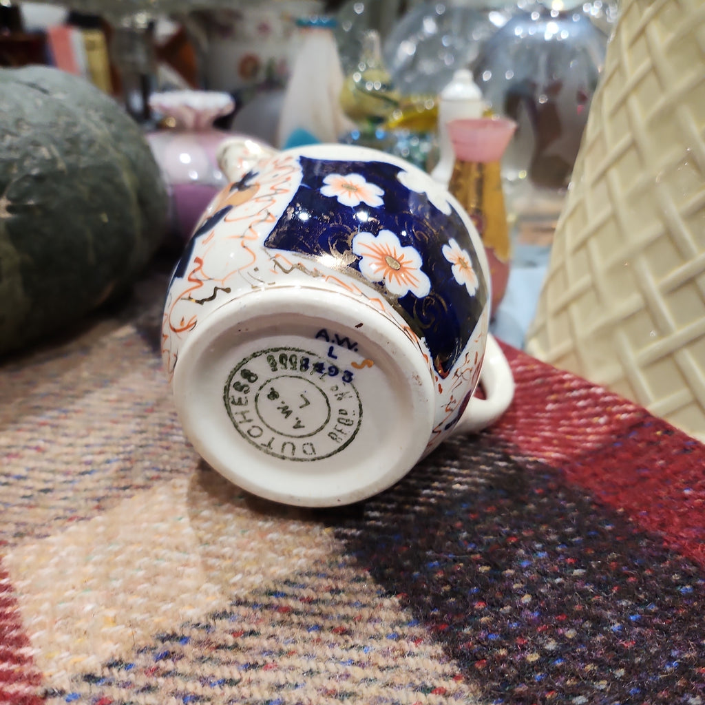 Early period dutchess handpainted imari milk jug