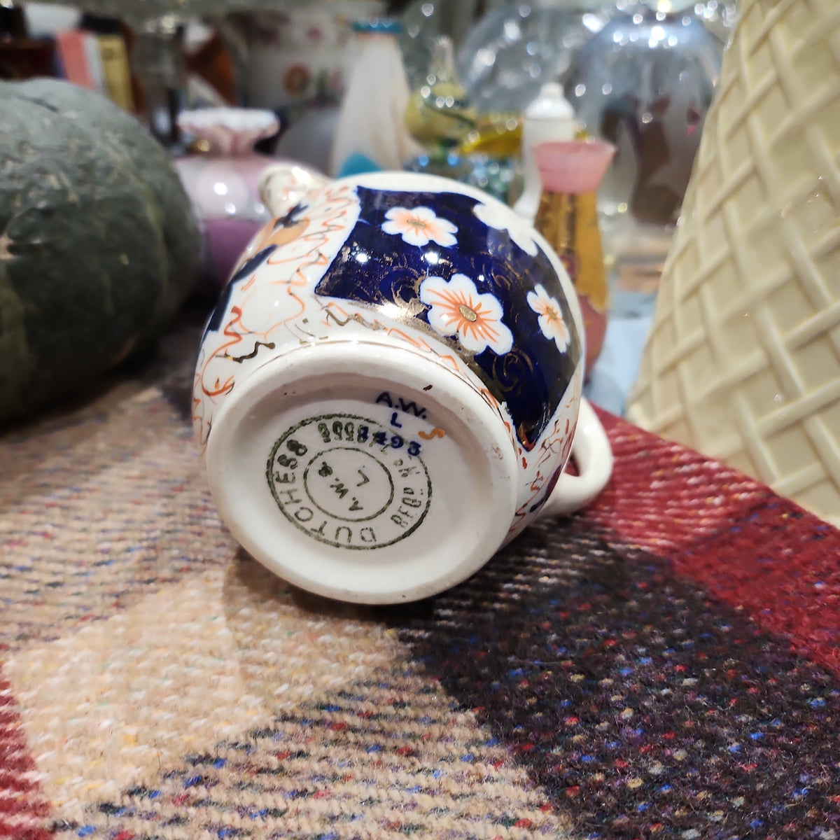 Early period dutchess handpainted imari milk jug