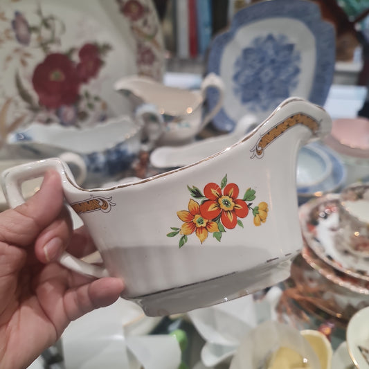 Early century pretty gravy boat