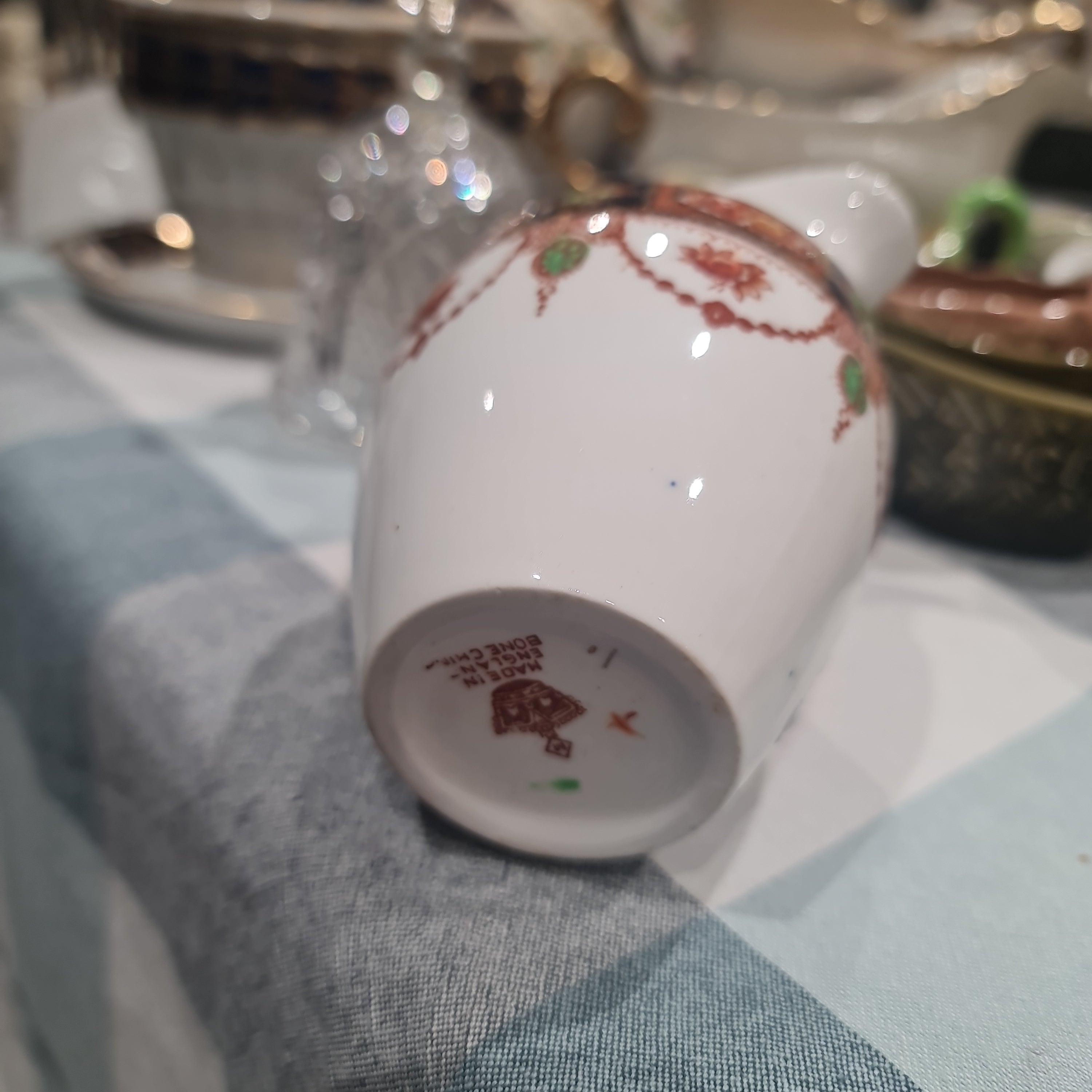 Antique handpainted imari milk jug - orange crown stamp