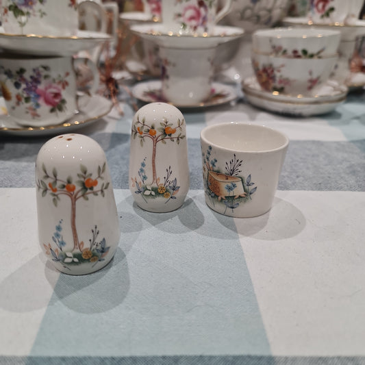 Lovely vintage salt and pepper canister + egg cup