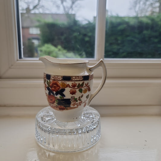 Antique handpainted imari milk jug- minor chip on spout
