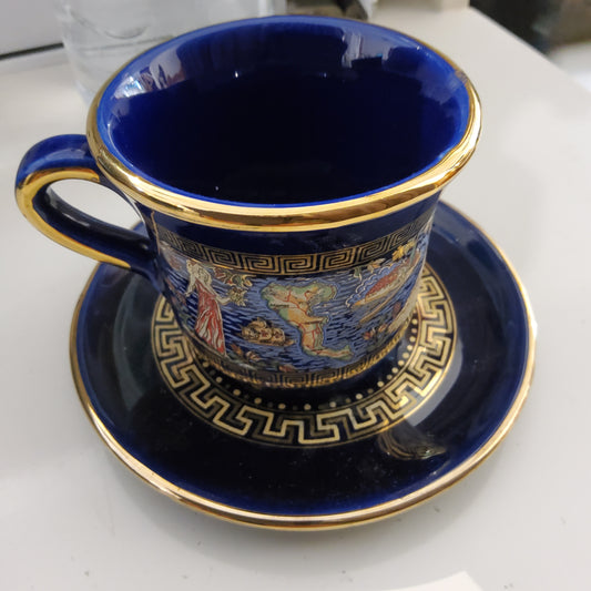A Greece cobalt blue and 24k gold attributed to Dagounis Ceramics colored demitasse cup and saucer