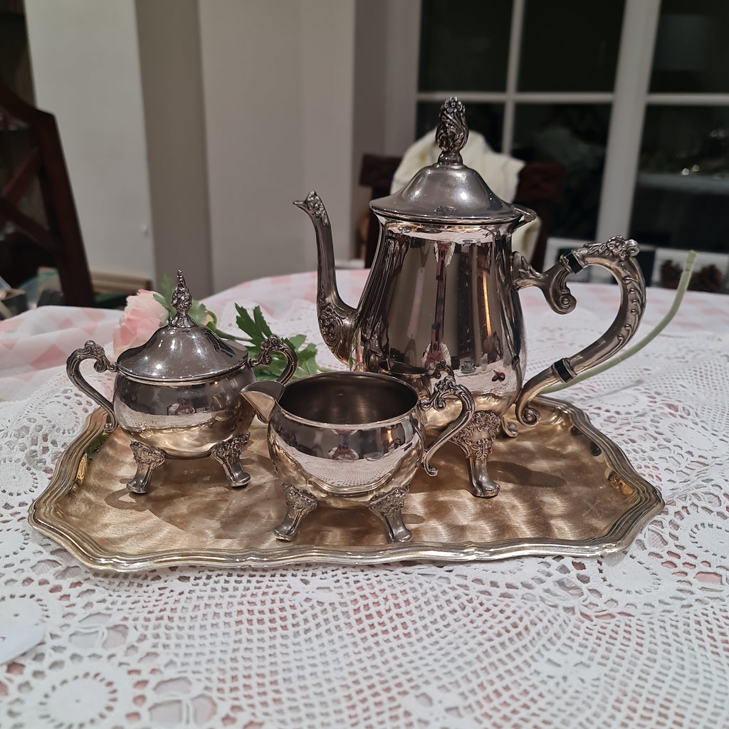 Vintage pewter tea pot , mill jug , sugar bowl and serving tray