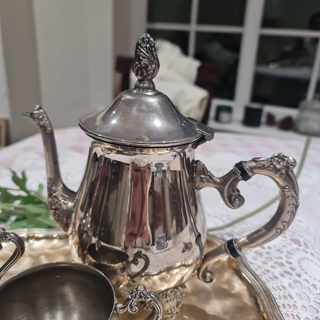 Vintage pewter tea pot , mill jug , sugar bowl and serving tray
