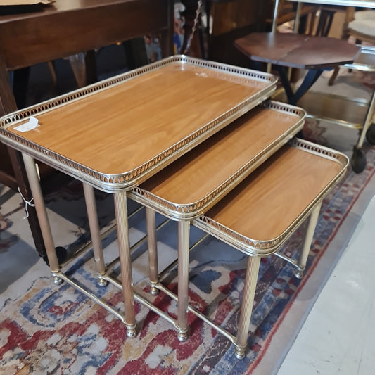 Lovely vintage nested table with gallery