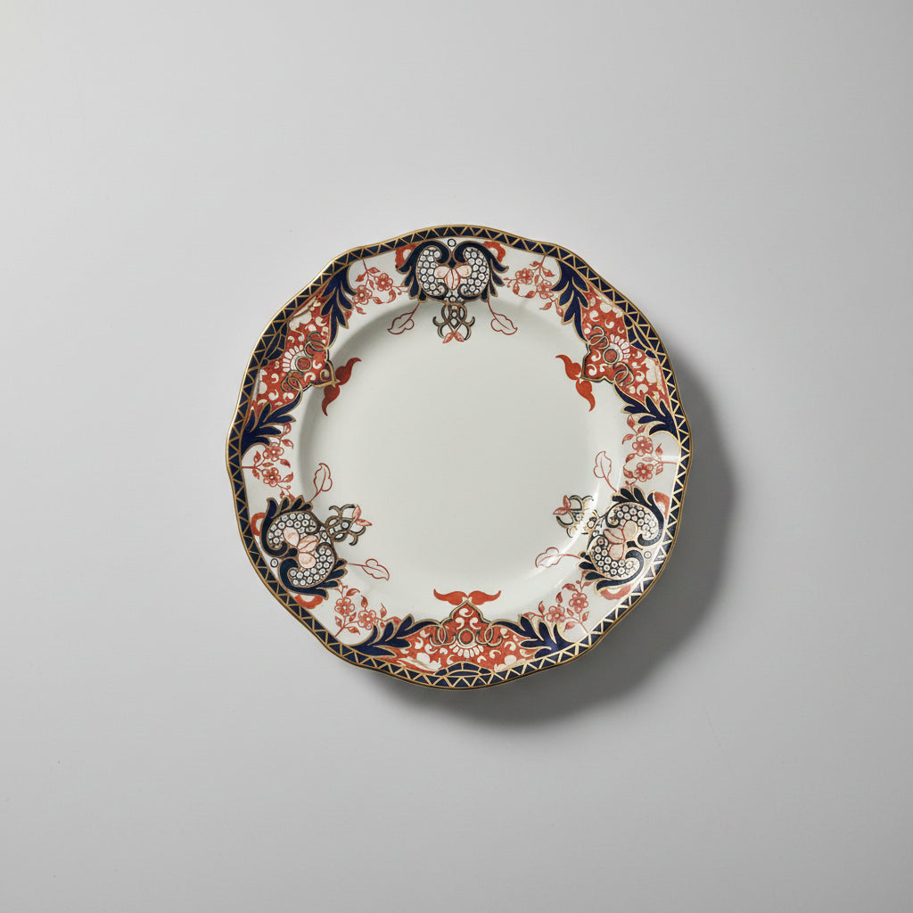 Decorative plate with intricate patterns on a gray background
