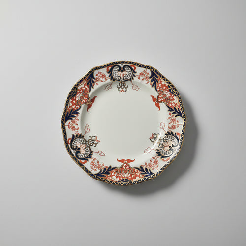 Decorative plate with intricate patterns on a gray background
