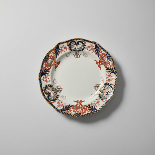 Decorative plate with intricate patterns on a gray background