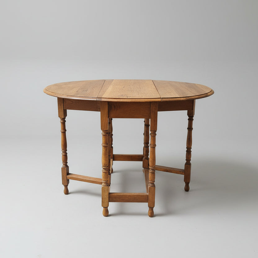 Wooden dining table with a gray background