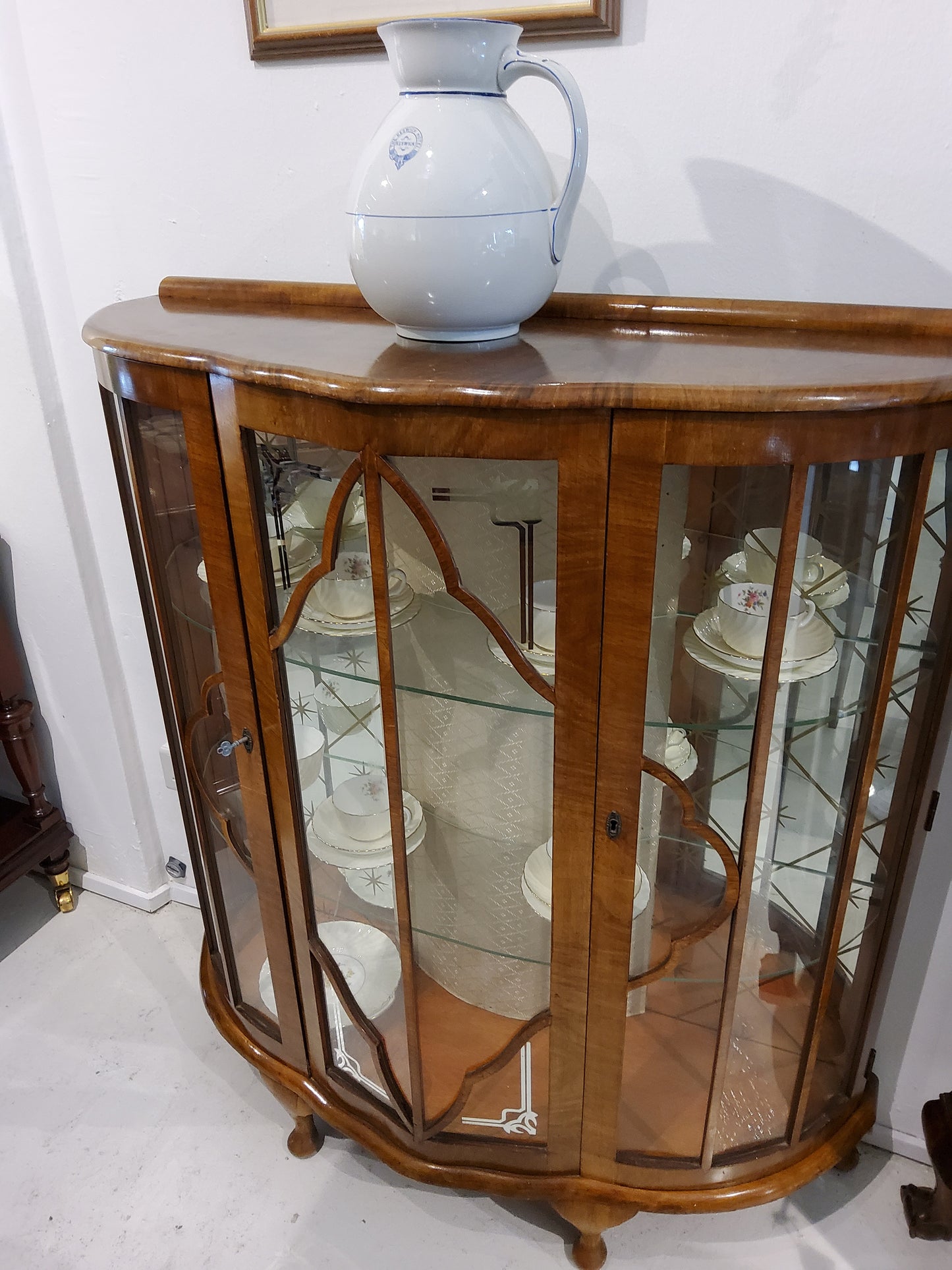 ENGLISH VINTAGE WALNUT CURVED FRONT DISPLAY CABINET
