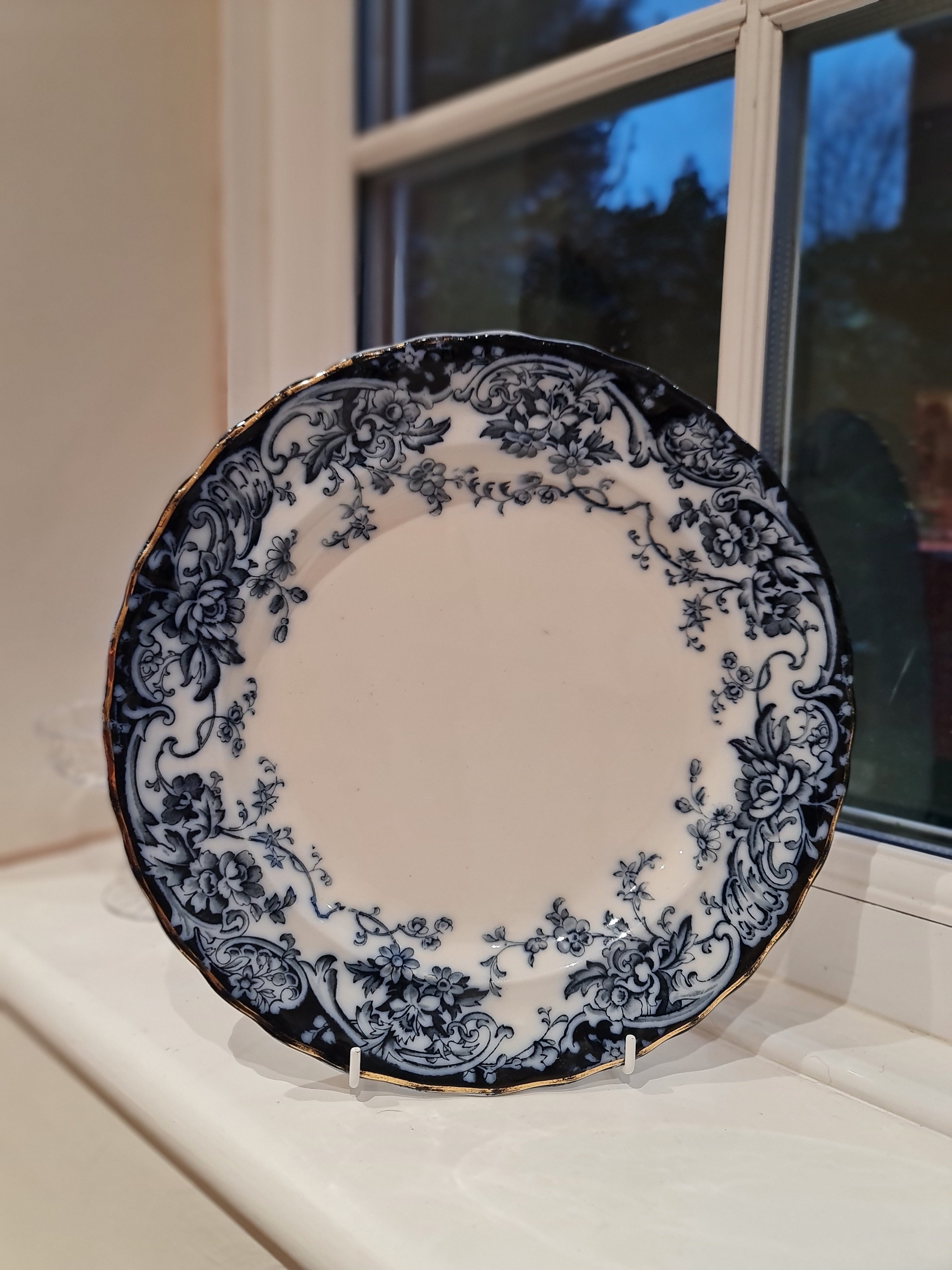 An antique plate in dark cobalt blue and white plate.  England1900, by Keeling & Co