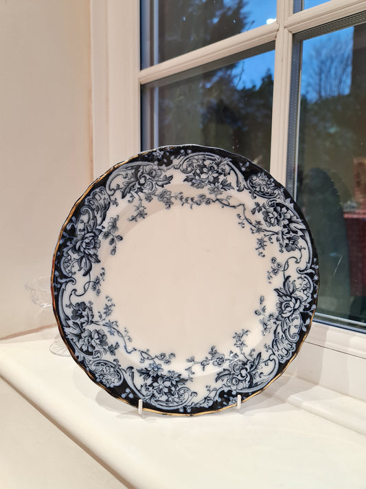An antique plate in dark cobalt blue and white plate.  England1900, by Keeling & Co
