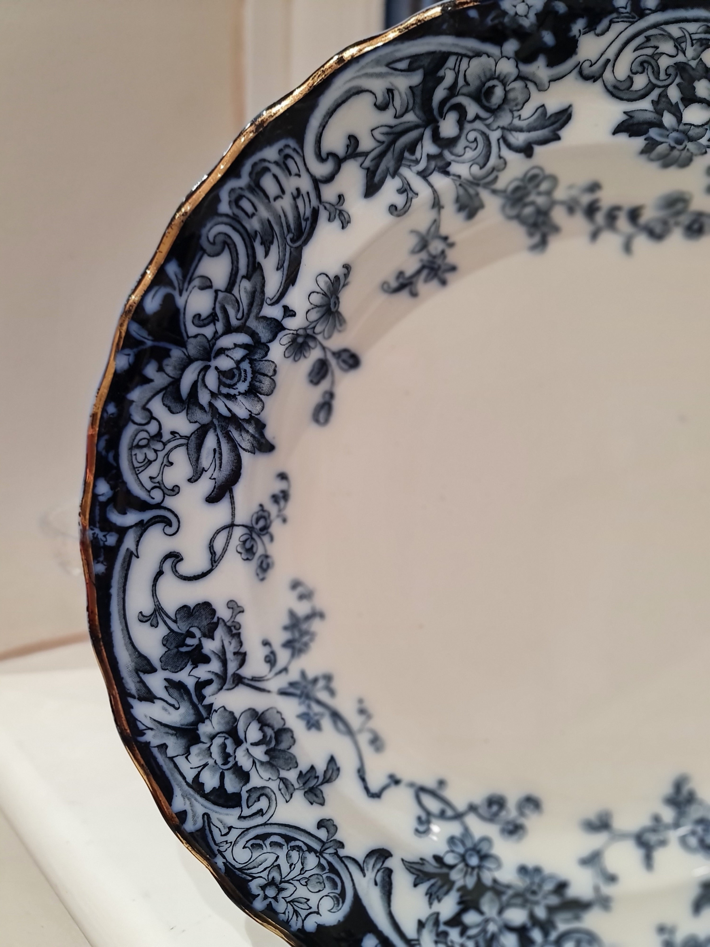 An antique plate in dark cobalt blue and white plate.  England1900, by Keeling & Co