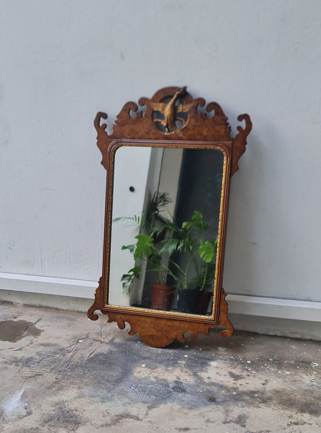 George II fretted walnut wall mirror.

Good colour to the well figured walnut frame bordering the carved gilt wood slip, original Mercury glass plate.

English 1740s.

H:59 W:34 D:1 CM