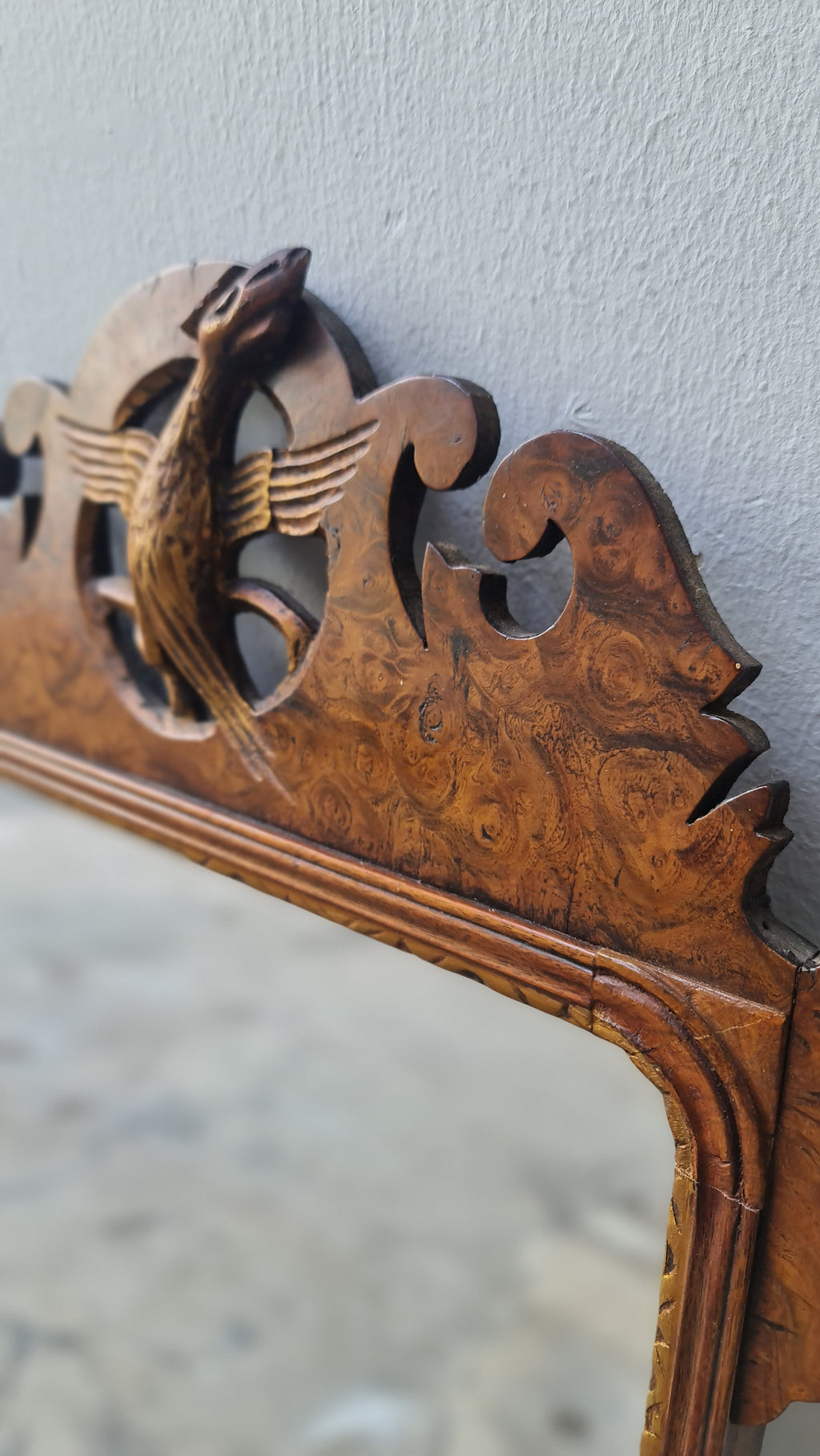 George II fretted walnut wall mirror.

Good colour to the well figured walnut frame bordering the carved gilt wood slip, original Mercury glass plate.

English 1740s.

H:59 W:34 D:1 CM