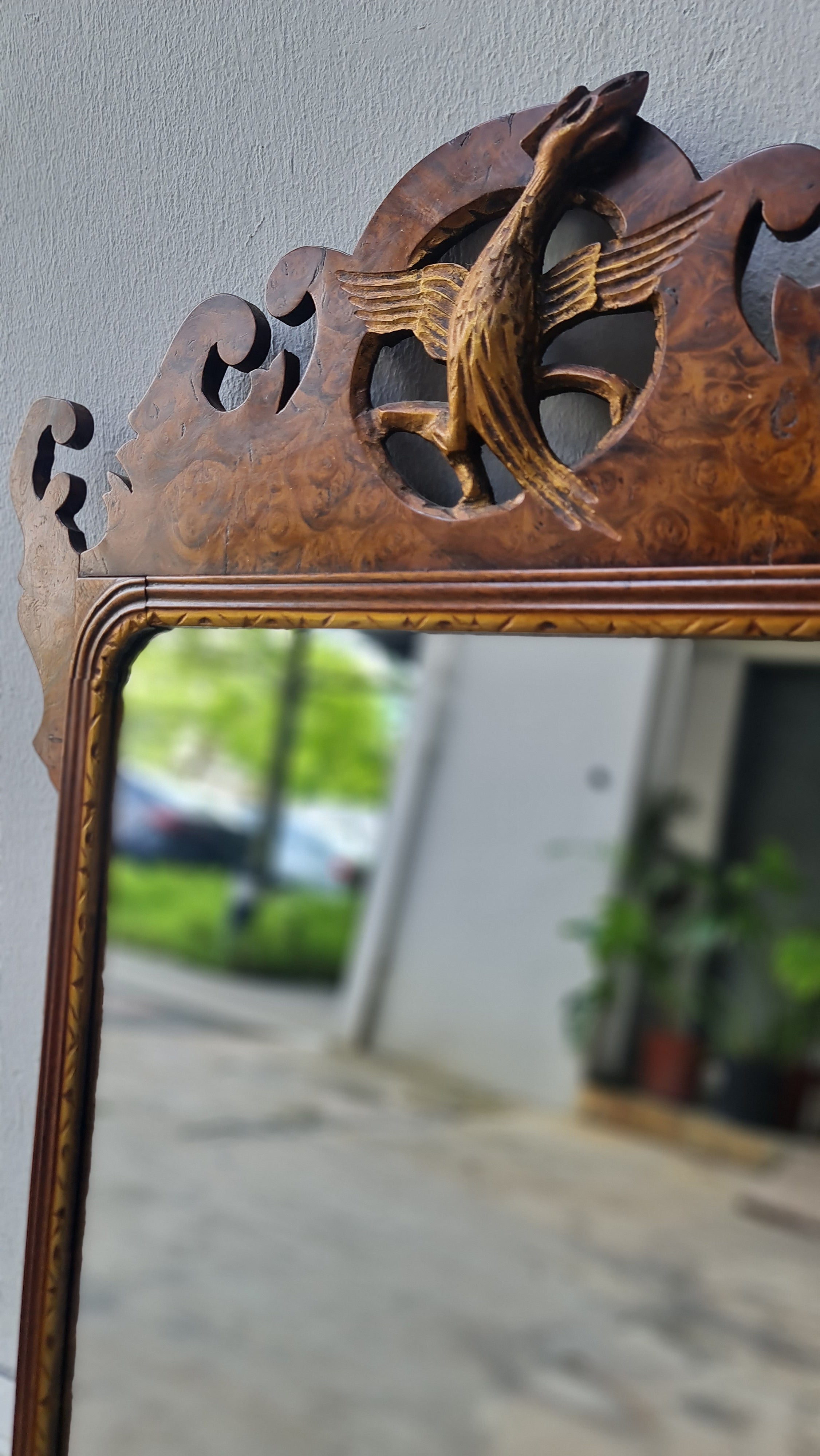 George II fretted walnut wall mirror.

Good colour to the well figured walnut frame bordering the carved gilt wood slip, original Mercury glass plate.

English 1740s.

H:59 W:34 D:1 CM