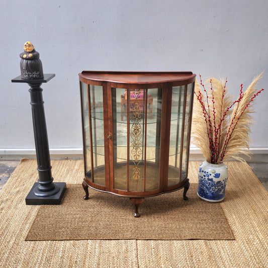 Antique bow front display cabinet with lnlay