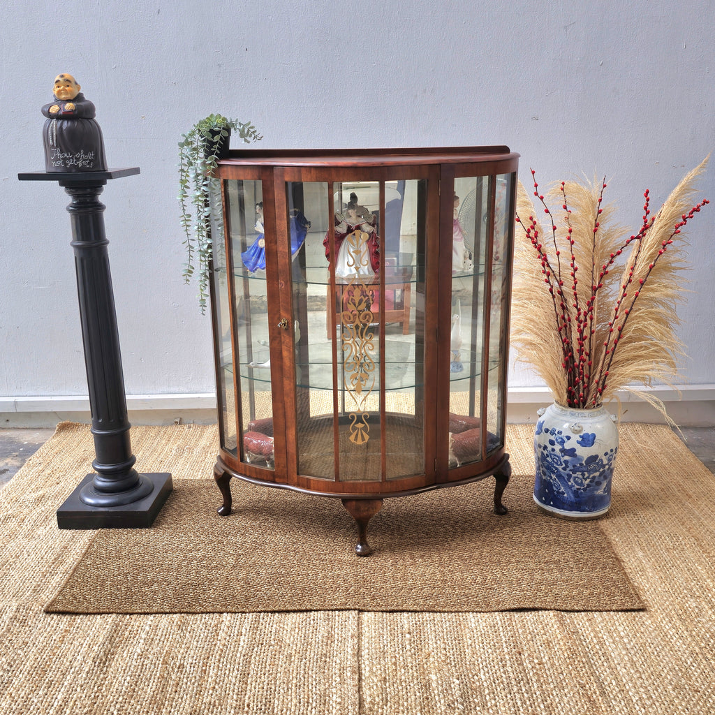Antique bow front display cabinet with lnlay