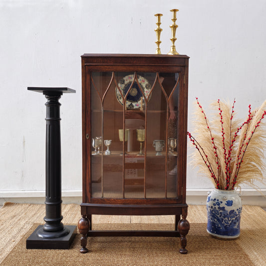 Antique oak display cabinet with gothic style leaded glass