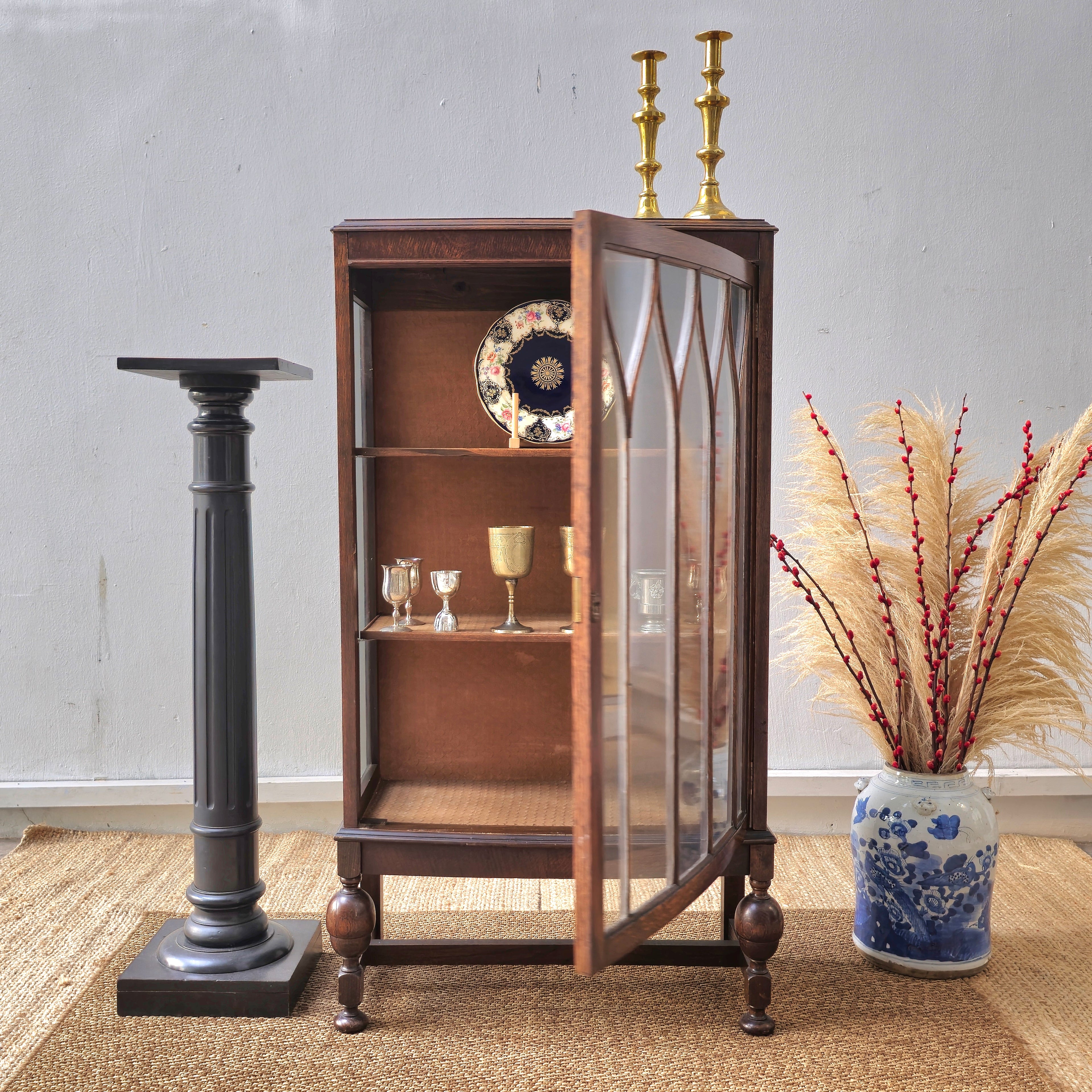 Antique oak display cabinet with gothic style leaded glass
