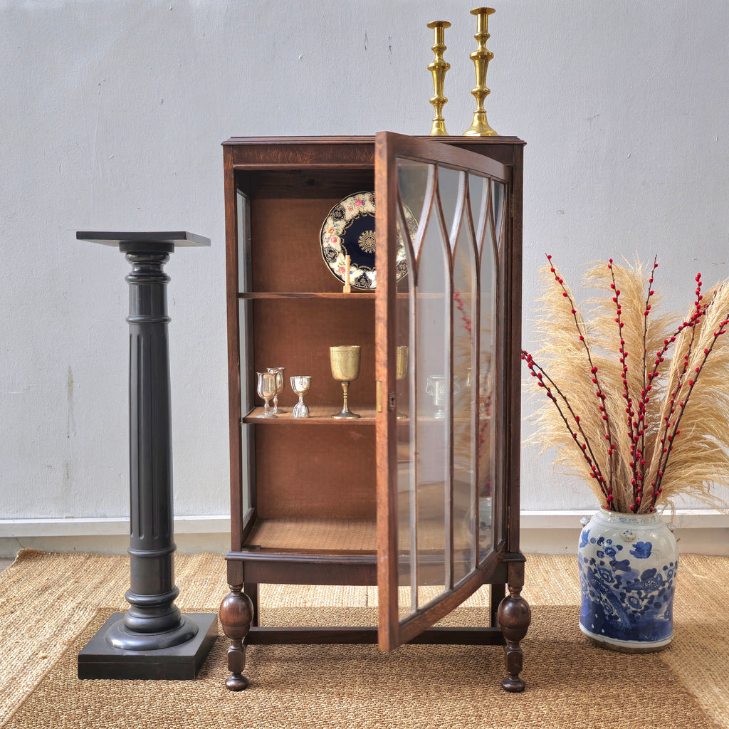 Antique oak display cabinet with gothic style leaded glass
