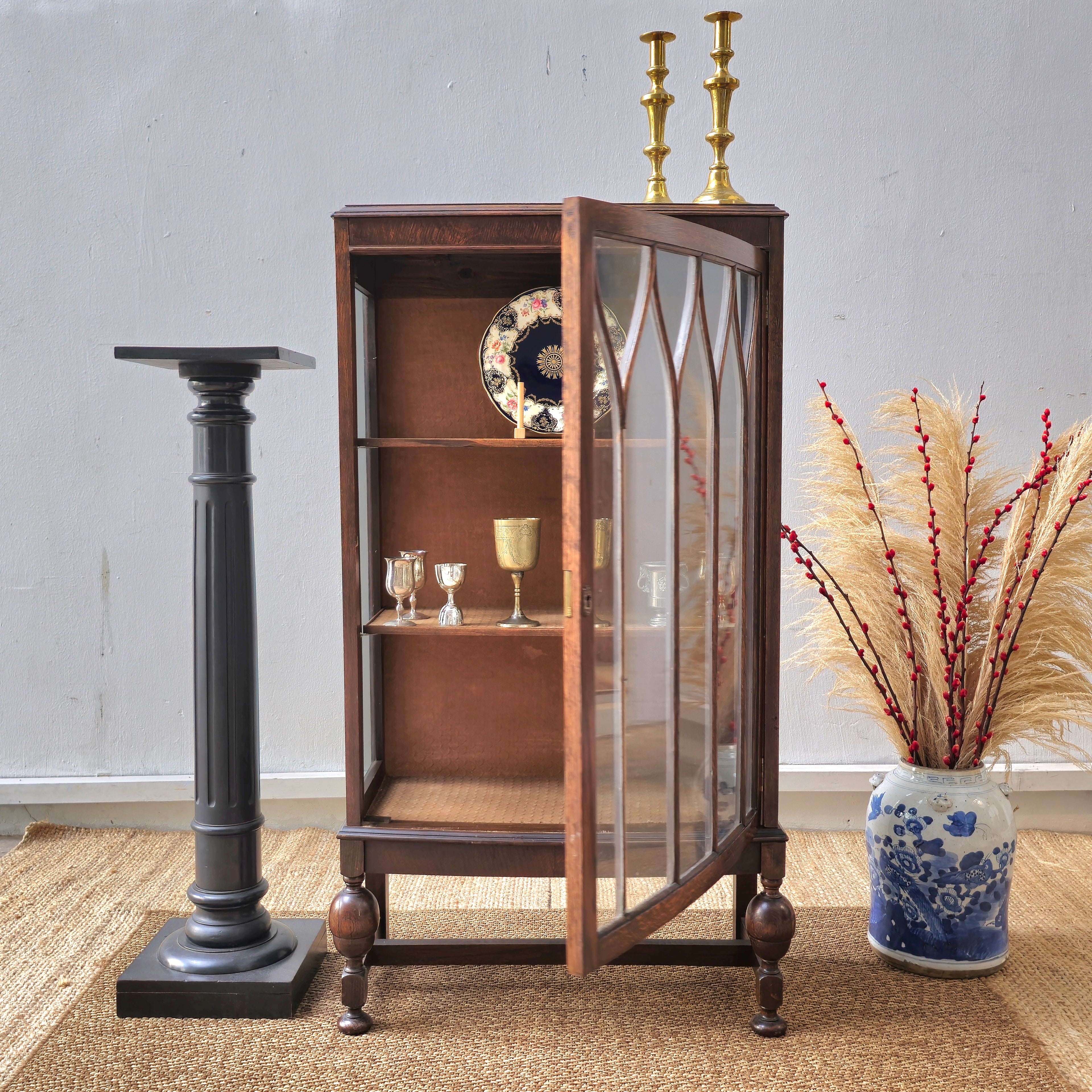 Antique oak display cabinet with gothic style leaded glass