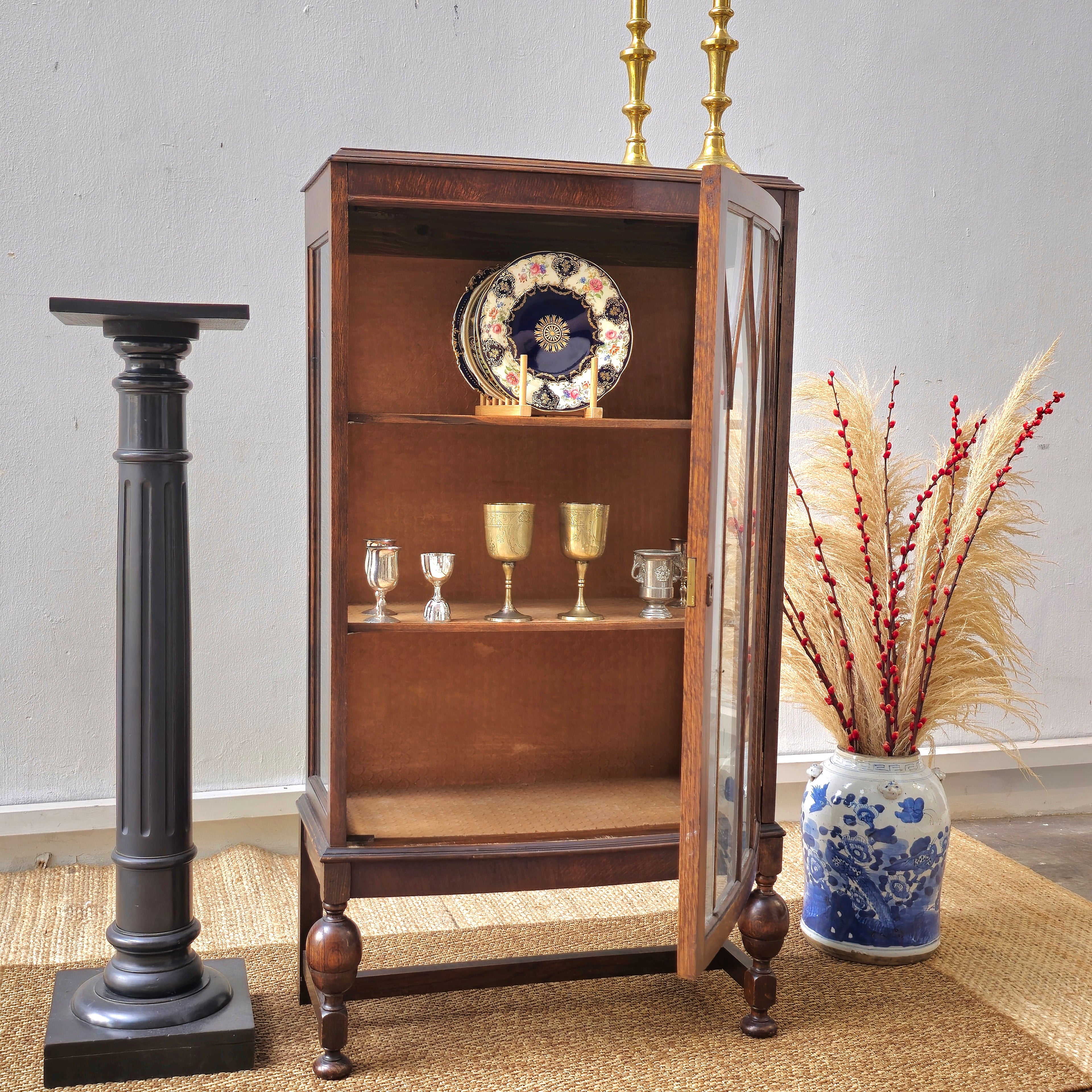 Antique oak display cabinet with gothic style leaded glass