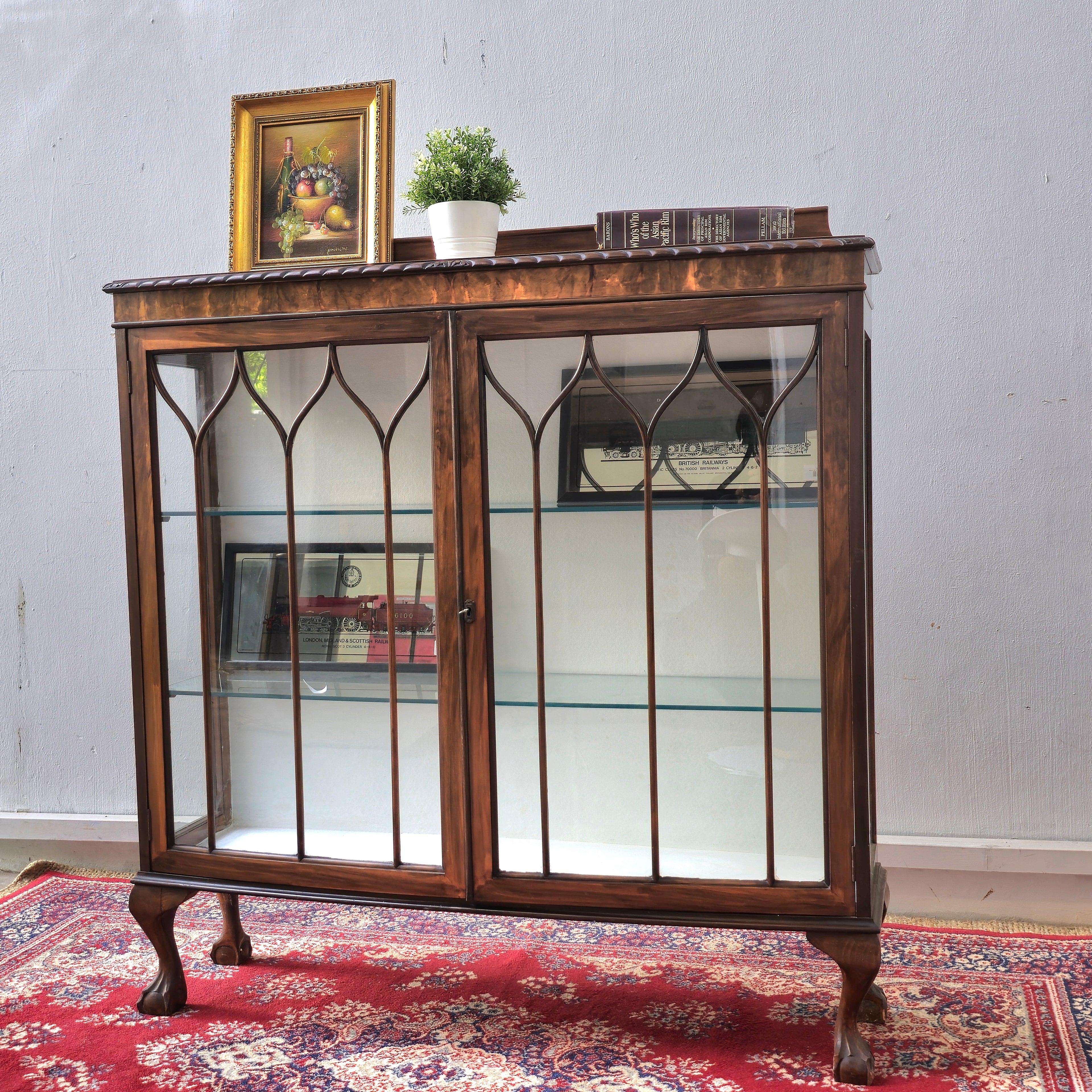 Edwardian revival glass display cabinet with gothic arched mullions