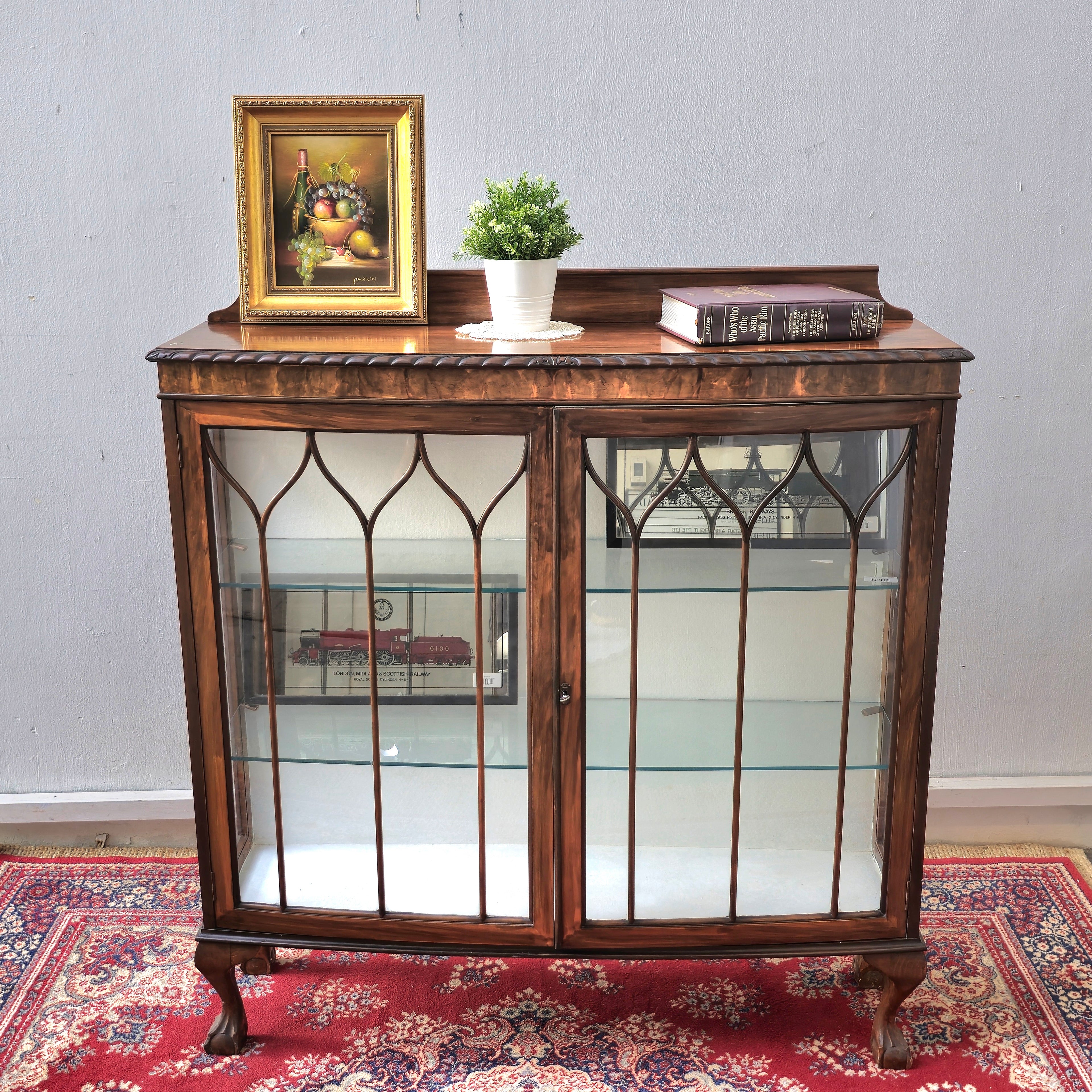 Edwardian revival glass display cabinet with gothic arched mullions