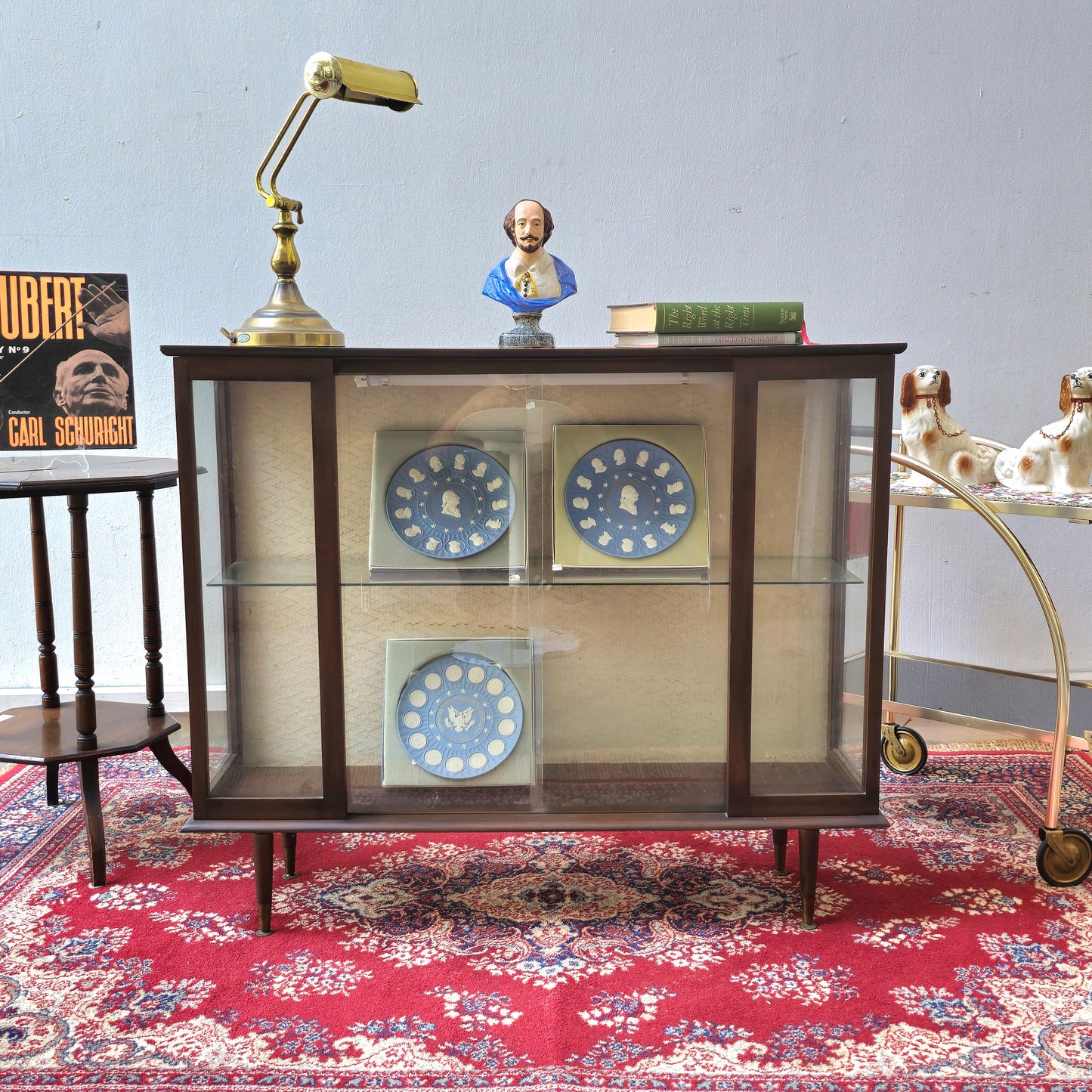 A Hubbinet 1960's glass display cabinet