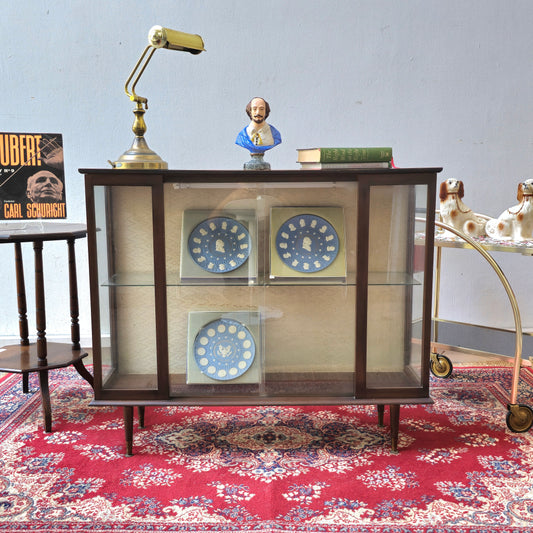 A Hubbinet 1960's glass display cabinet