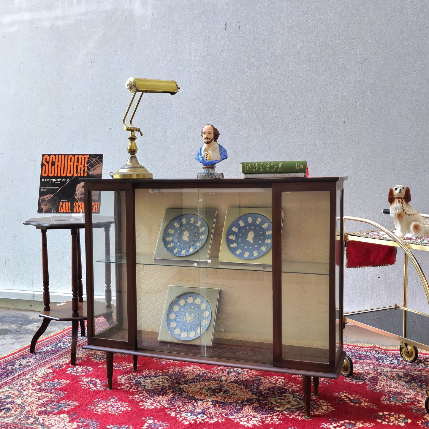 A Hubbinet 1960's glass display cabinet