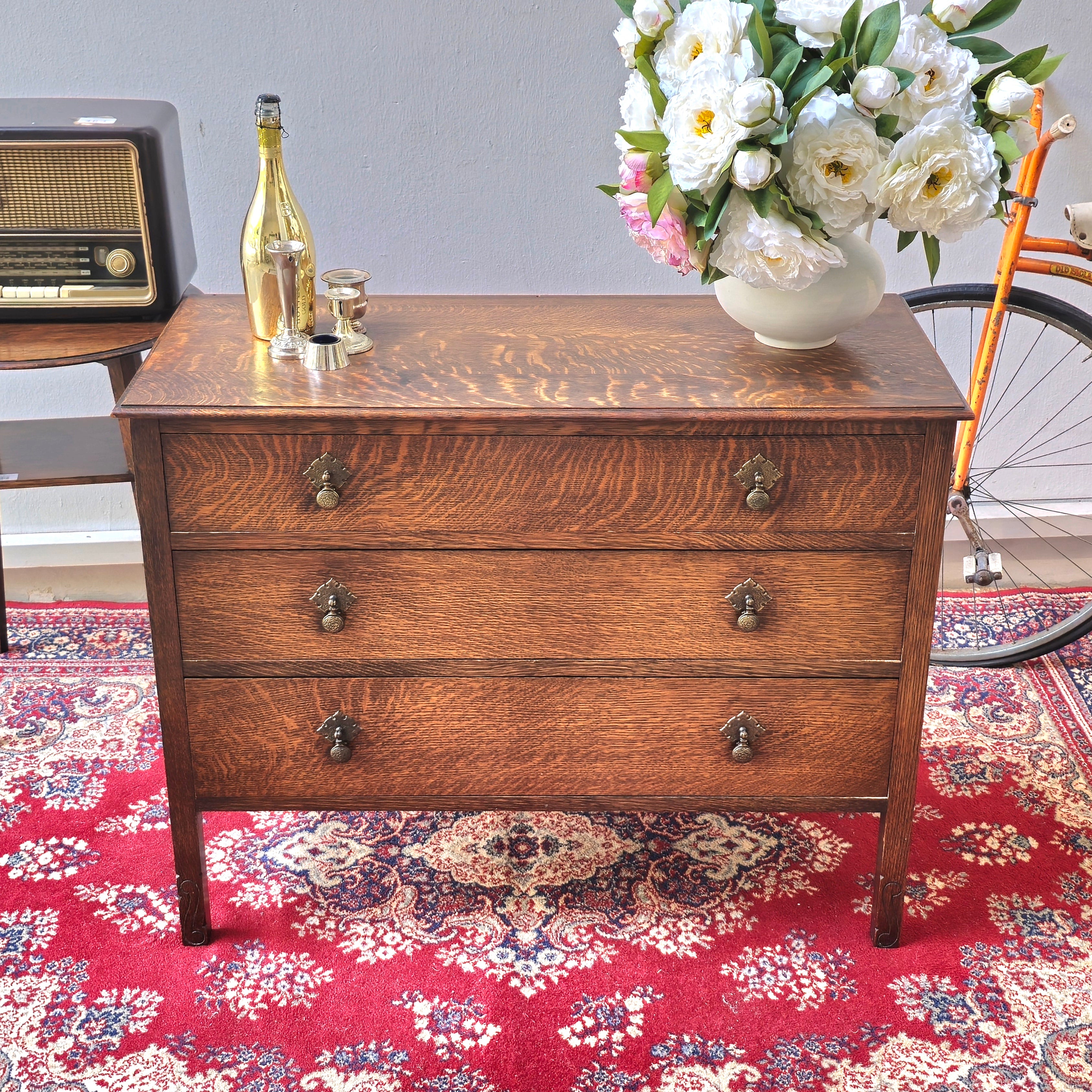 A 1930's Oak chest of 4 long drawers