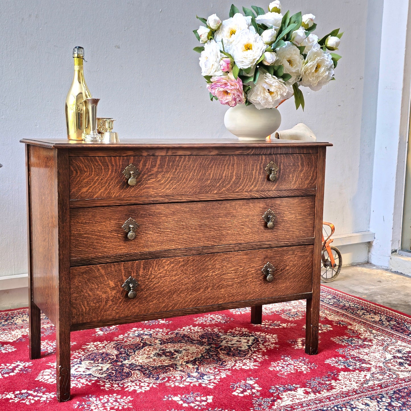 A 1930's Oak chest of 4 long drawers