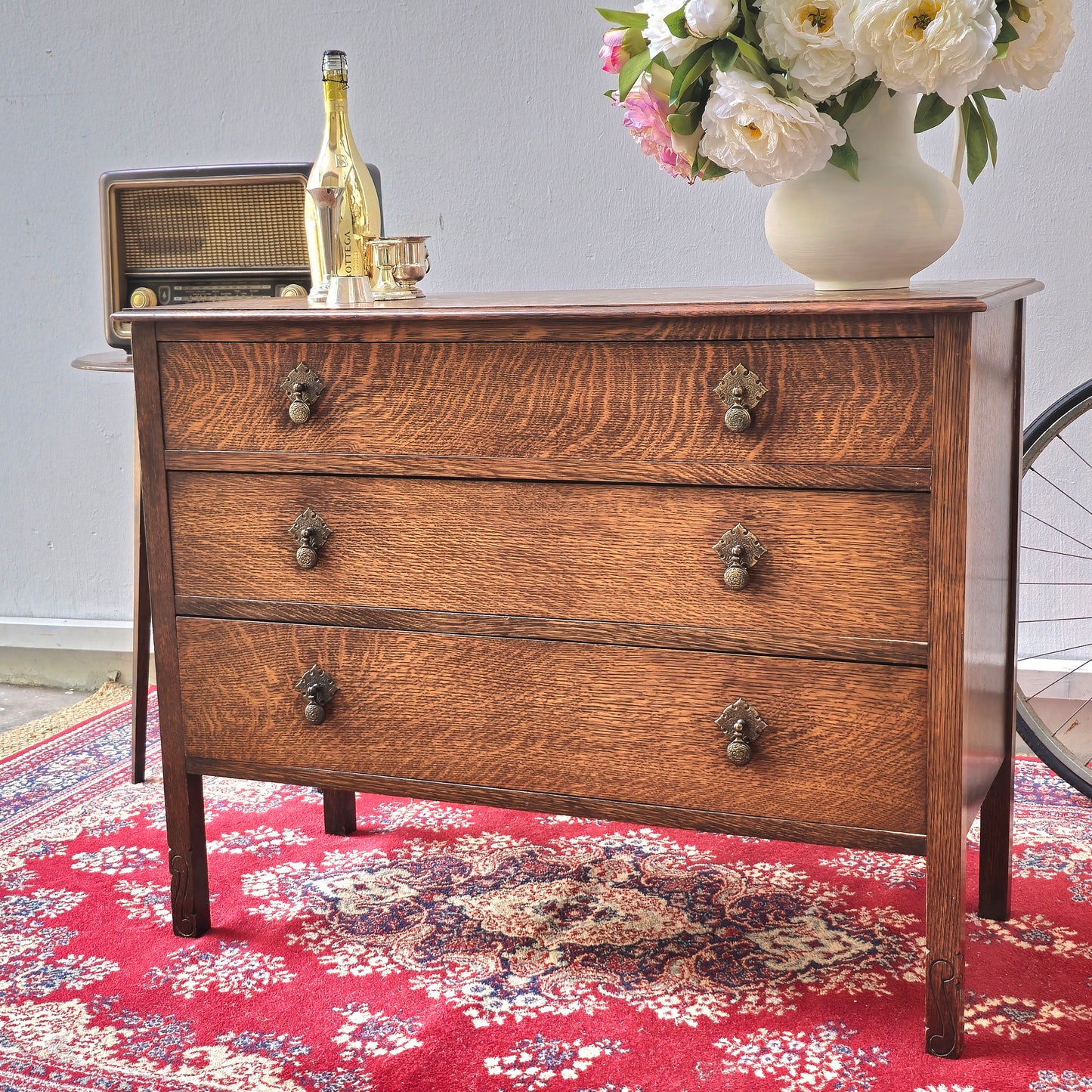 A 1930's Oak chest of 4 long drawers