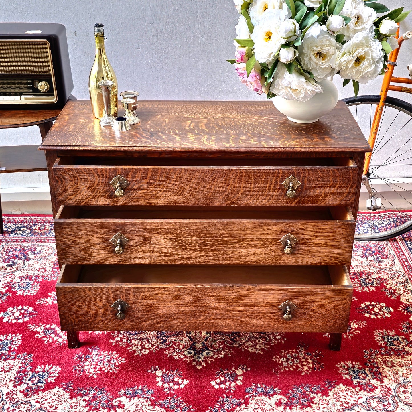 A 1930's Oak chest of 4 long drawers