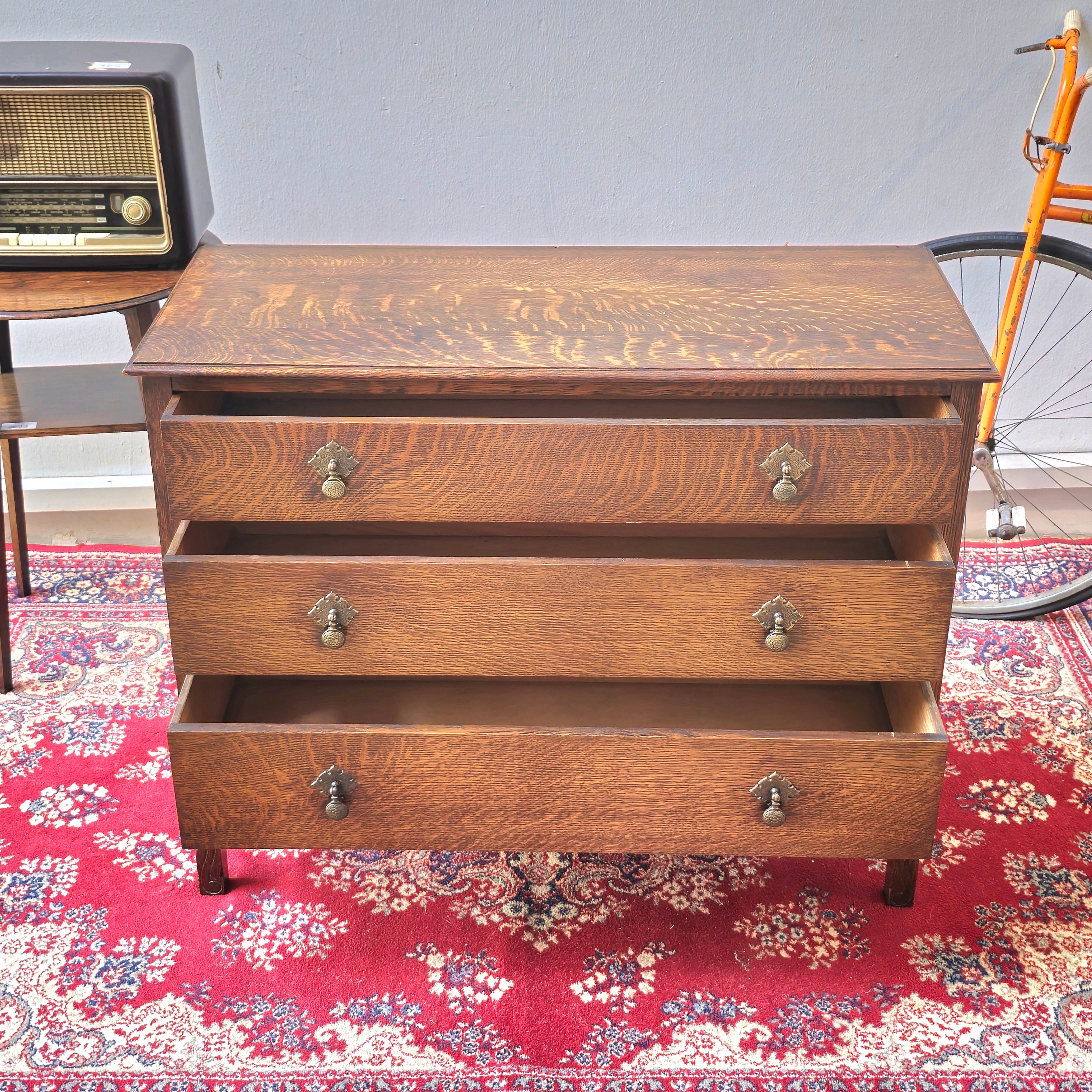 A 1930's Oak chest of 4 long drawers
