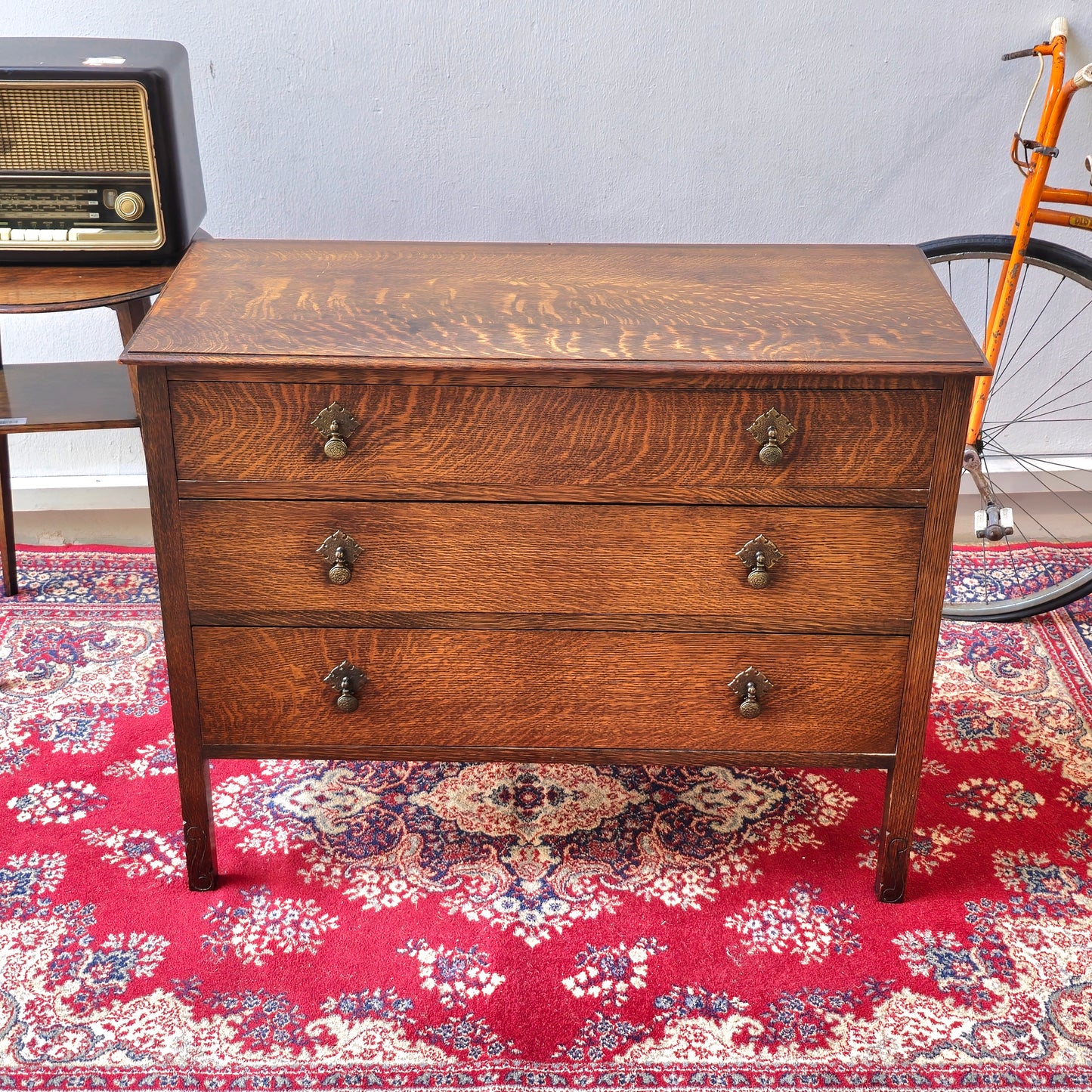 A 1930's Oak chest of 4 long drawers