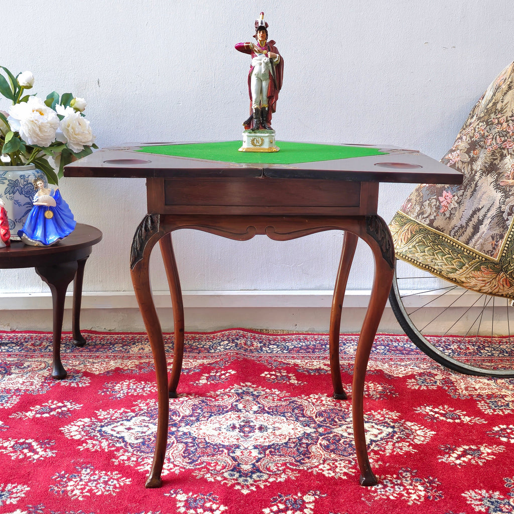 Antique folding card table with green felt top