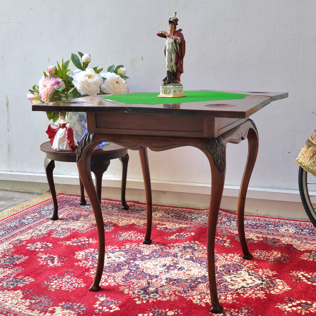 Antique folding card table with green felt top