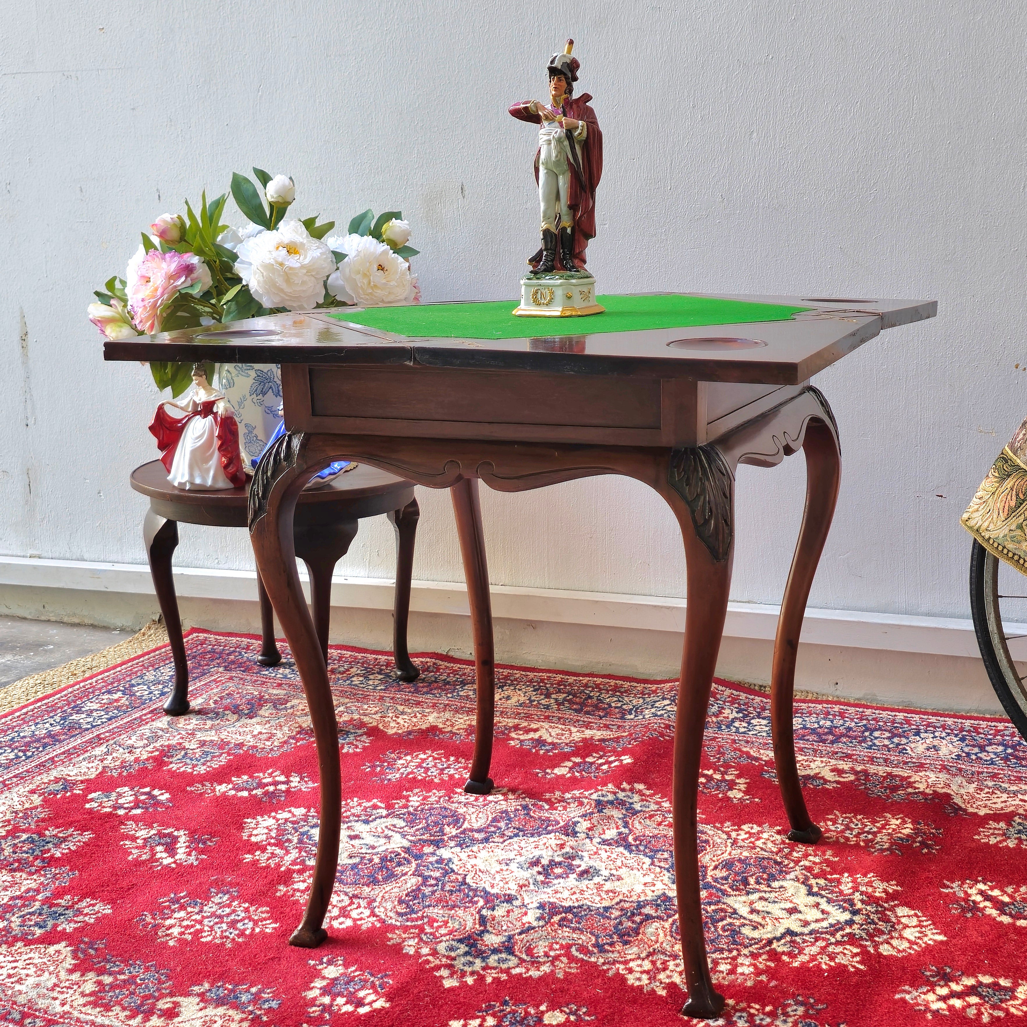 Antique folding card table with green felt top