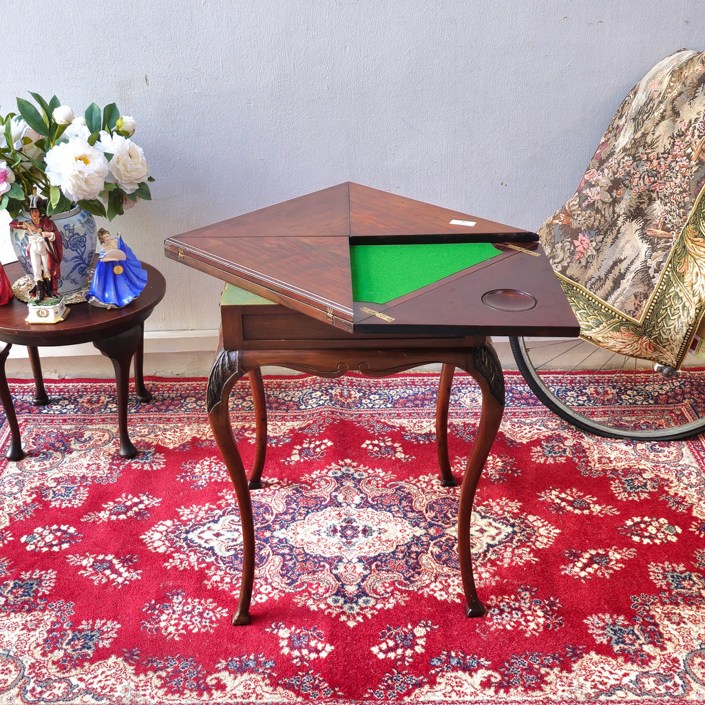 Antique folding card table with green felt top