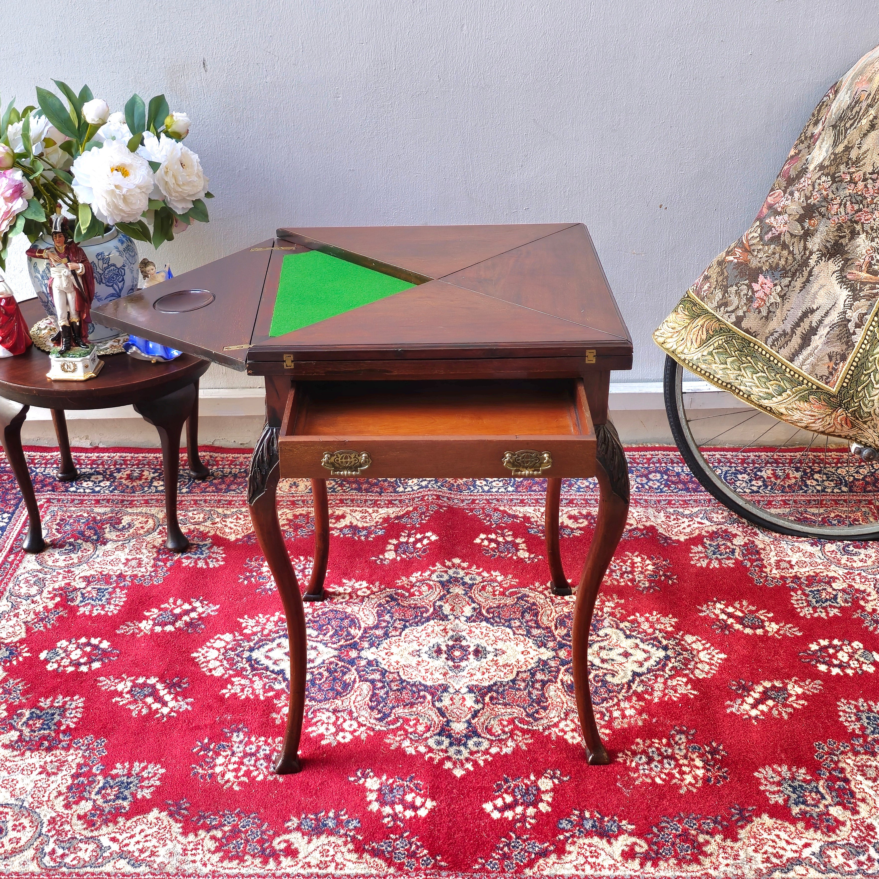 Antique folding card table with green felt top