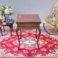Antique folding card table with green felt top