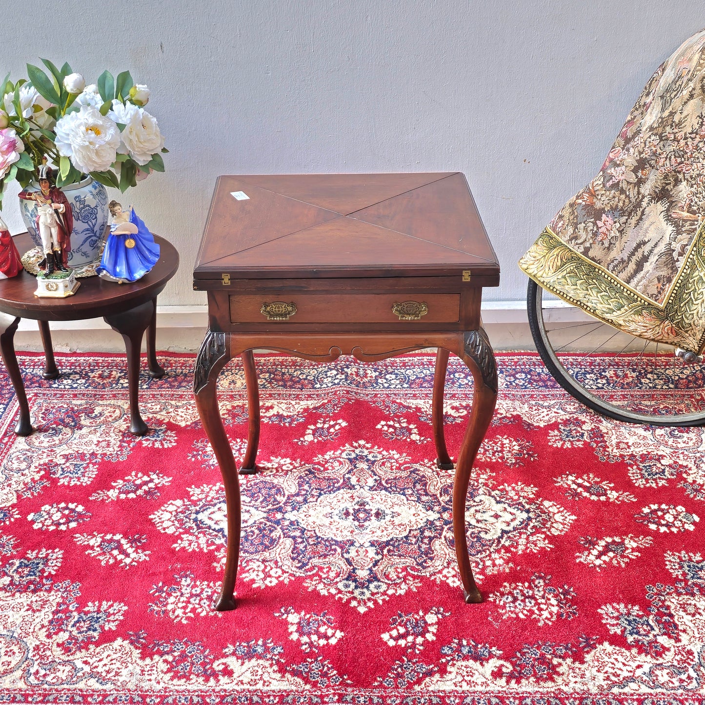 Antique folding card table with green felt top