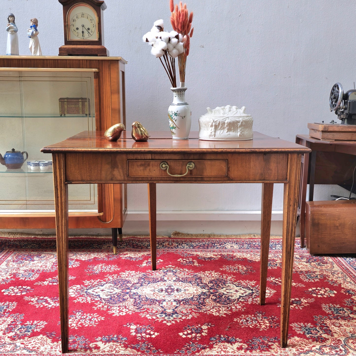 19th Century mahogany fold over tea table, fitted with a small drawer