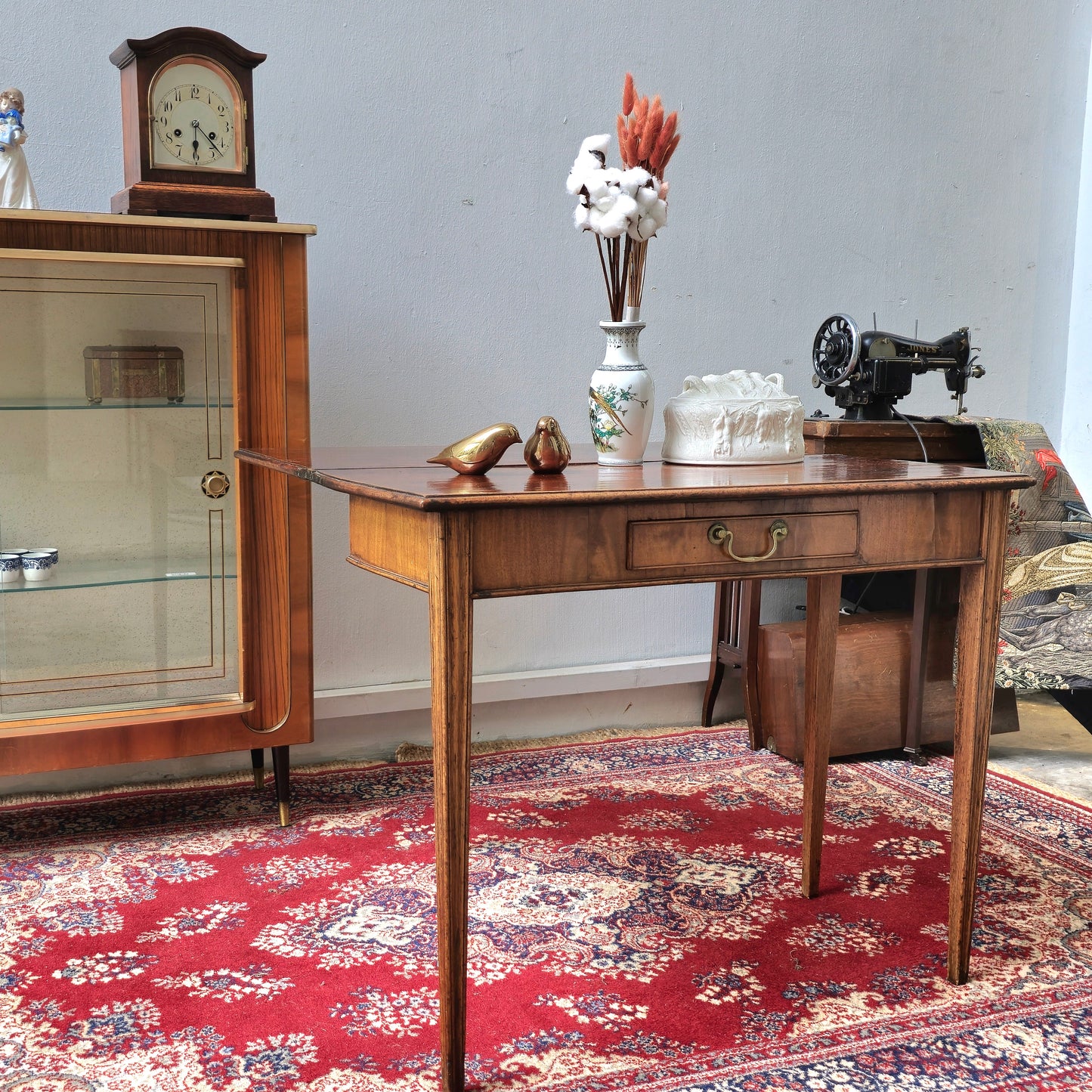 19th Century mahogany fold over tea table, fitted with a small drawer