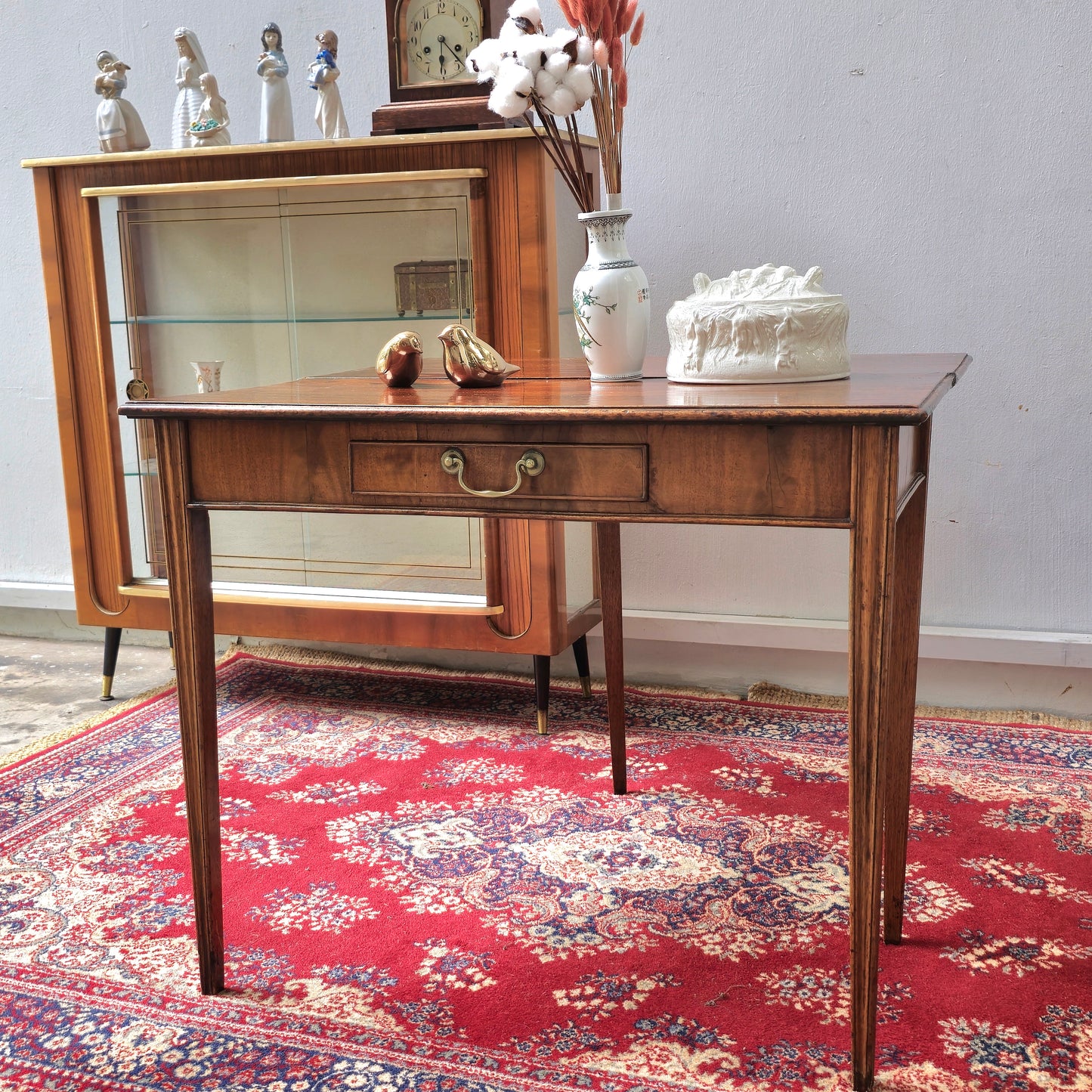 19th Century mahogany fold over tea table, fitted with a small drawer