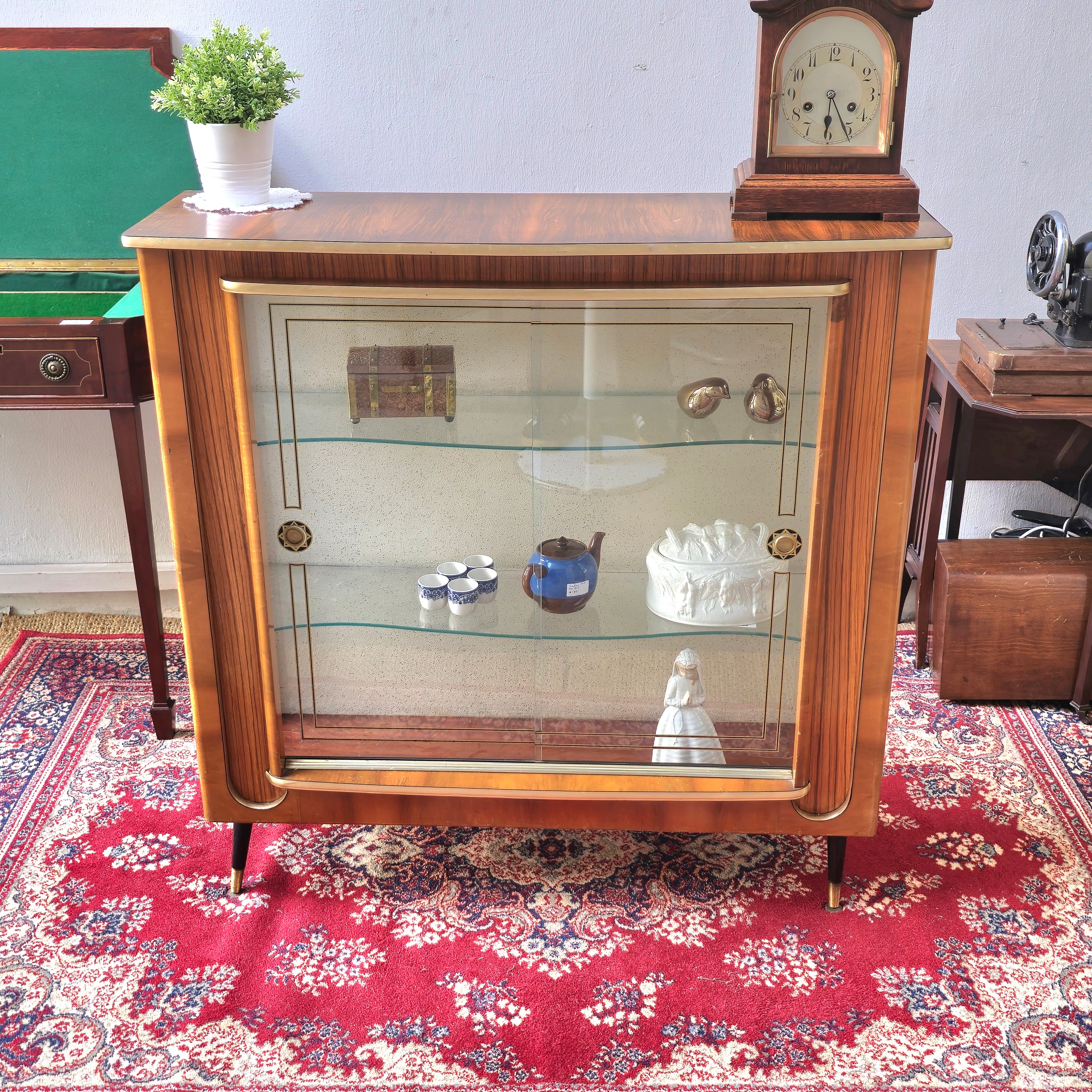 Vintage English display cabinet with teak compass legs, 1970